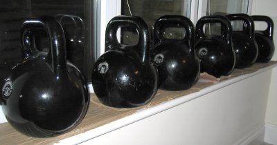 Six Black Kettlebells